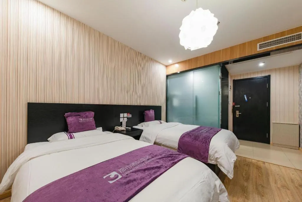 Bed in City 118 Hotel Qingdao Boardcast Tower