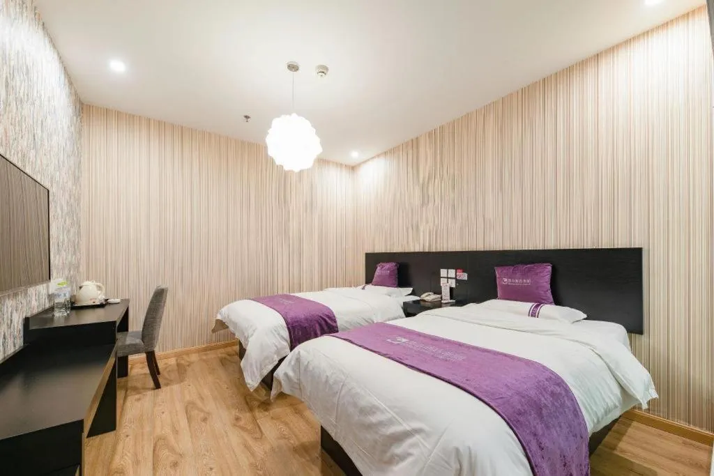 Bed in City 118 Hotel Qingdao Boardcast Tower