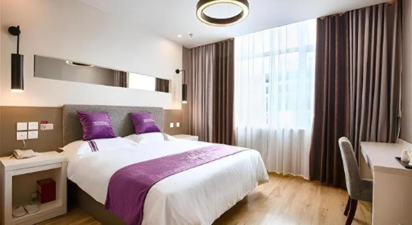 Bed in City 118 Hotel Qingdao Boardcast Tower