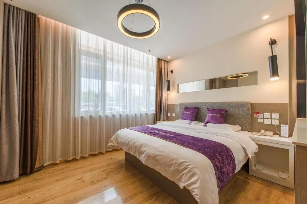 Bed in City 118 Hotel Qingdao Boardcast Tower