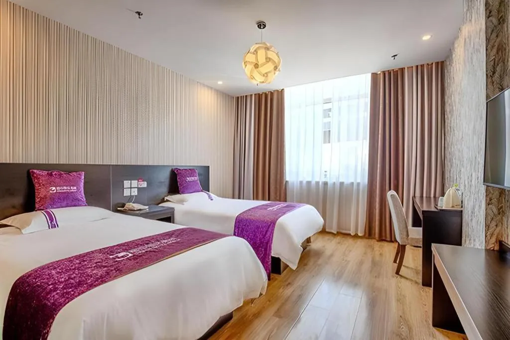 Bed in City 118 Hotel Qingdao Boardcast Tower