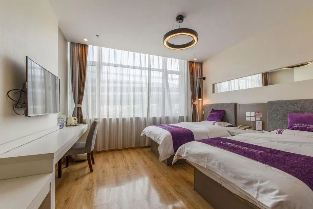 Bed in City 118 Hotel Qingdao Boardcast Tower