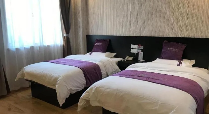 Bed in City 118 Hotel Qingdao Boardcast Tower