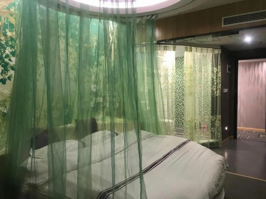 Bed in City 118 Hotel Qingdao Boardcast Tower