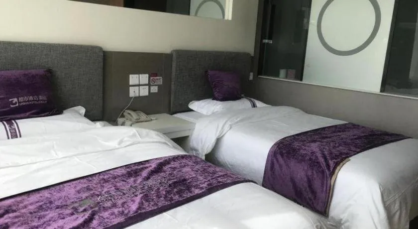 Bed in City 118 Hotel Qingdao Boardcast Tower