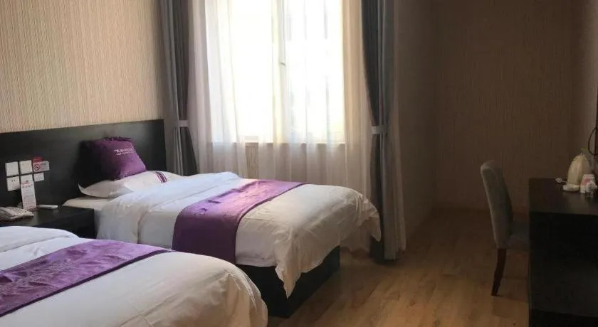 Bed in City 118 Hotel Qingdao Boardcast Tower