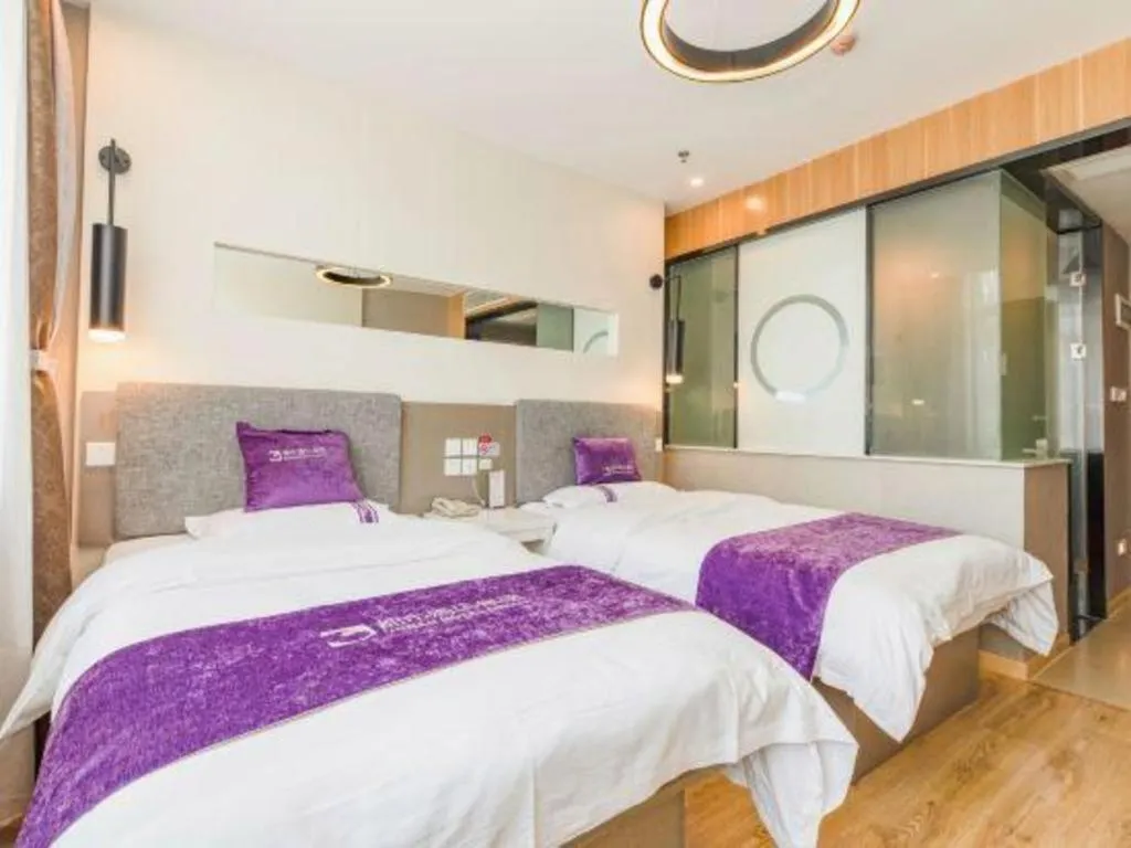 Bed in City 118 Hotel Qingdao Boardcast Tower