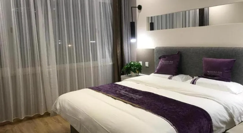 Bed in City 118 Hotel Qingdao Boardcast Tower