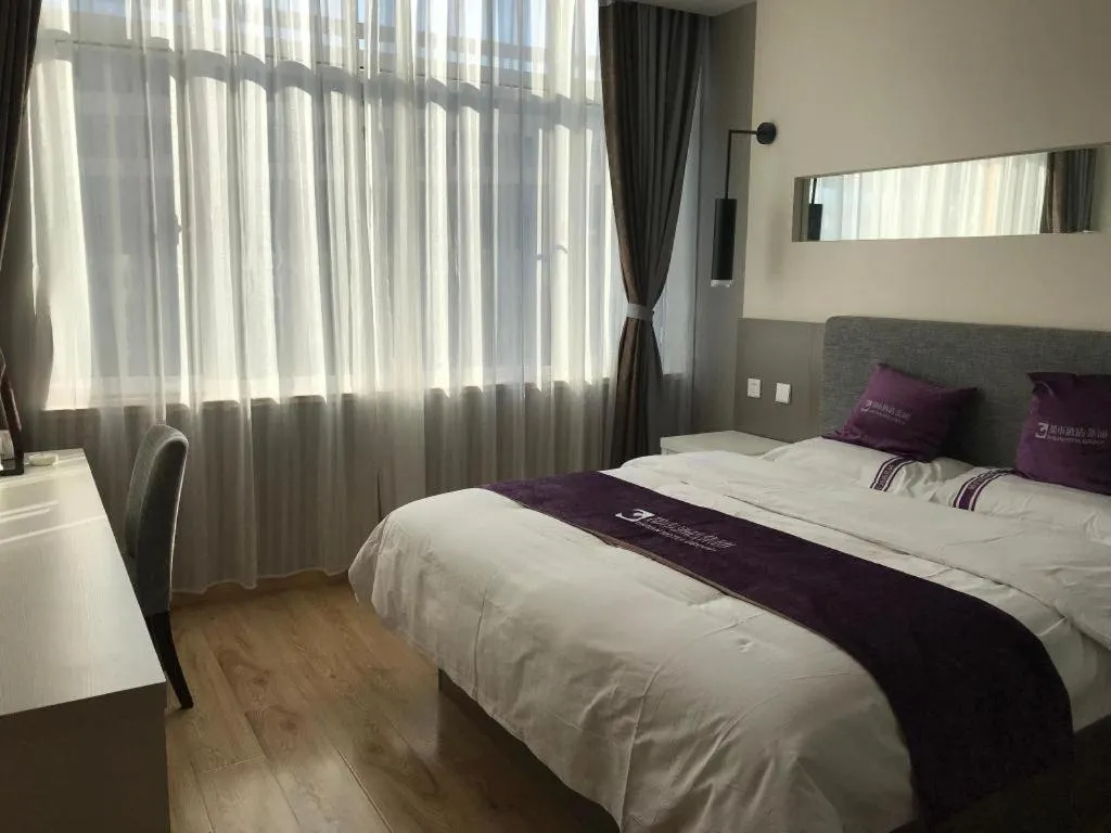 Bed in City 118 Hotel Qingdao Boardcast Tower