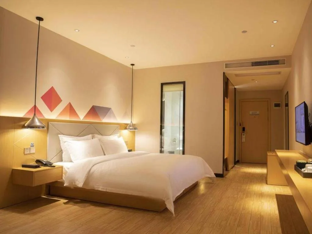 Bed in Borrman Hotel Dongguan Zhongtang