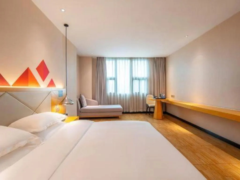 Bed in Borrman Hotel Dongguan Zhongtang