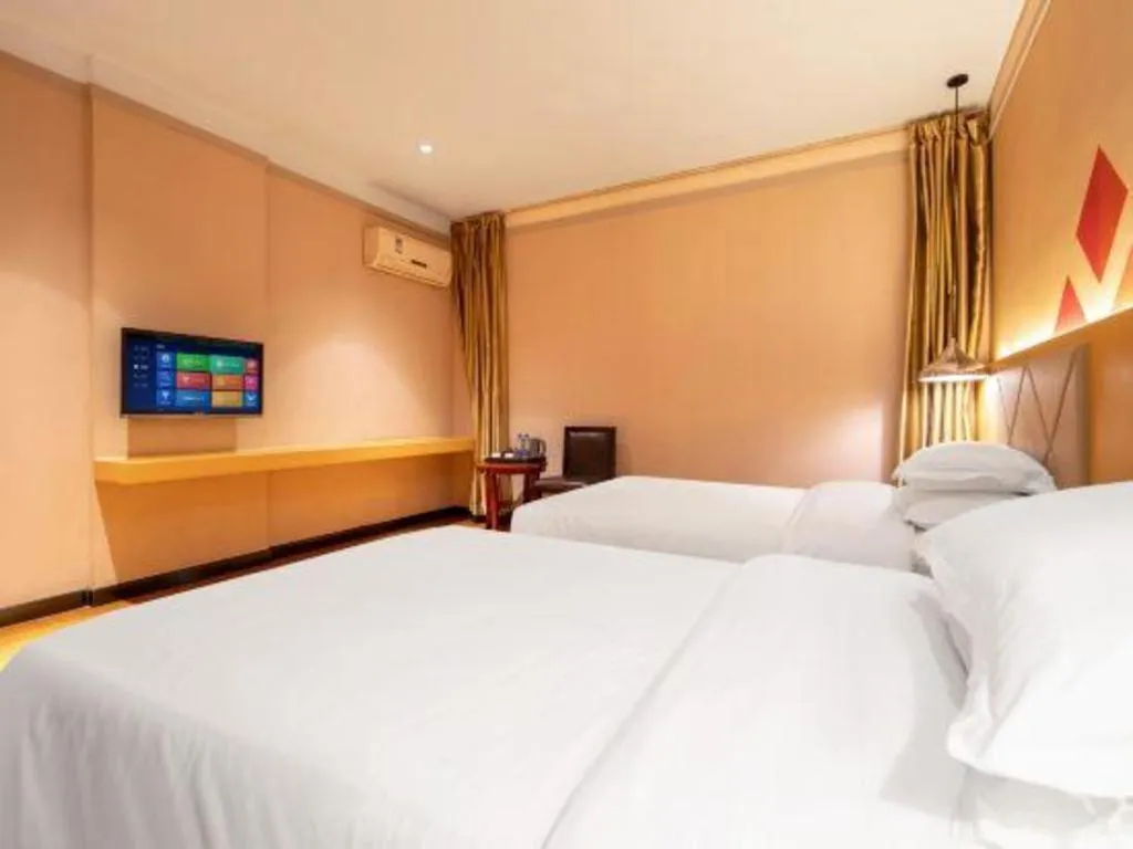 Bed in Borrman Hotel Dongguan Zhongtang