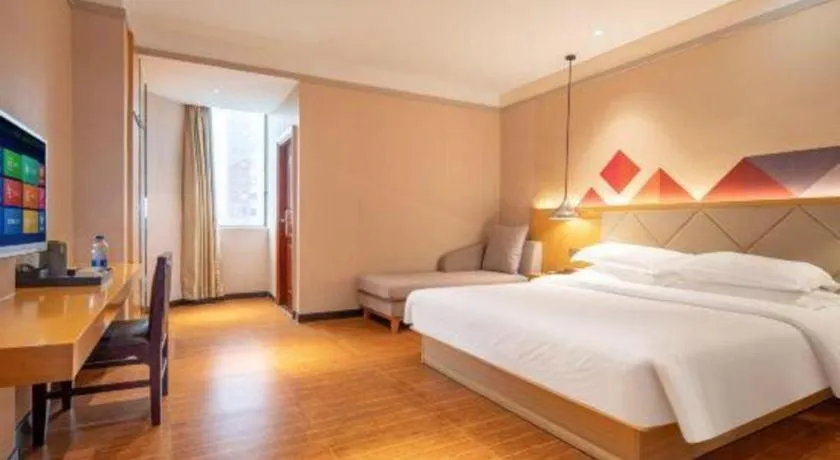 Bed in Borrman Hotel Dongguan Zhongtang