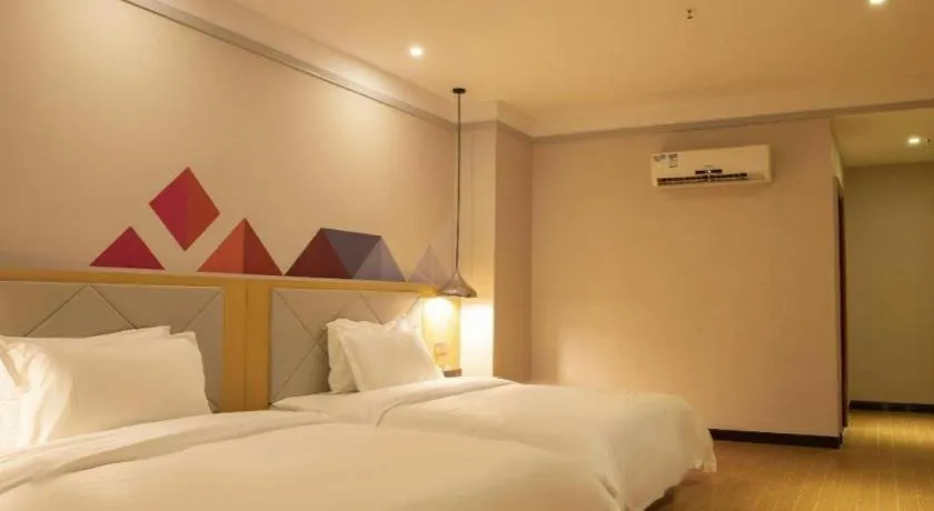 Bed in Borrman Hotel Dongguan Zhongtang