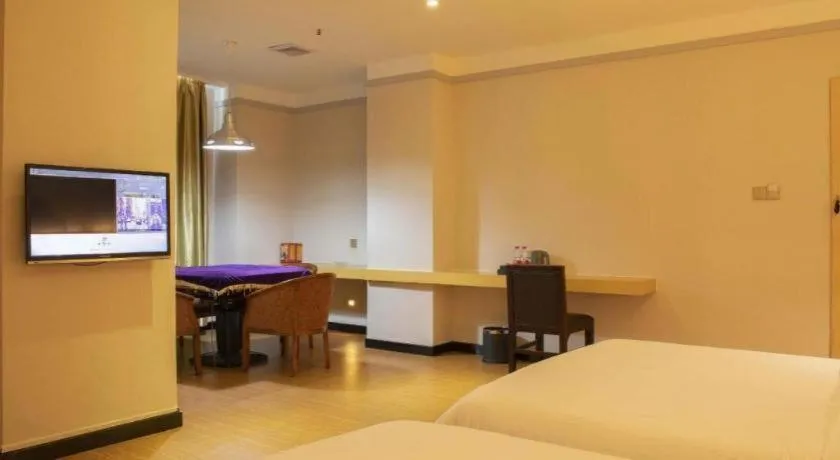 Bed in Borrman Hotel Dongguan Zhongtang