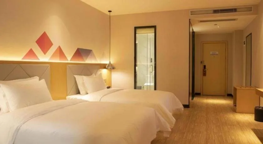 Bed in Borrman Hotel Dongguan Zhongtang