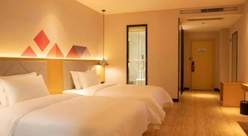 Bed in Borrman Hotel Dongguan Zhongtang