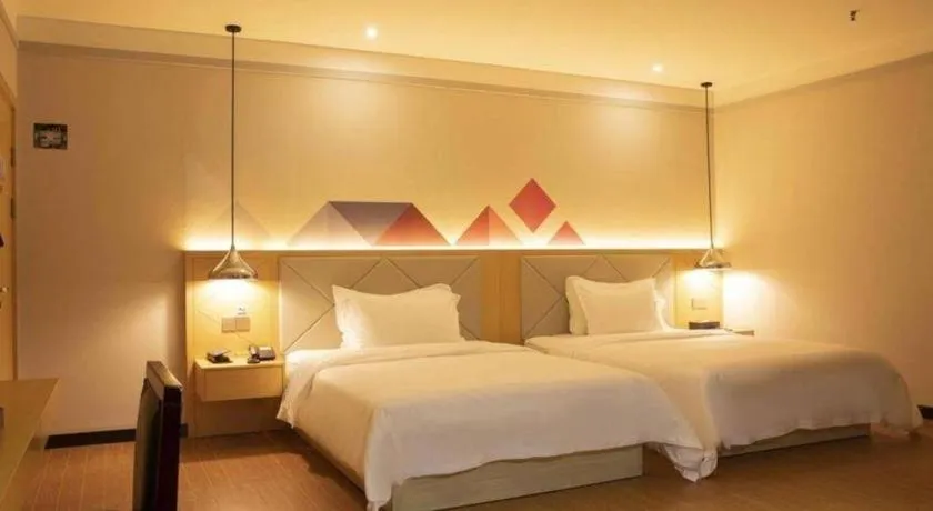 Bed in Borrman Hotel Dongguan Zhongtang