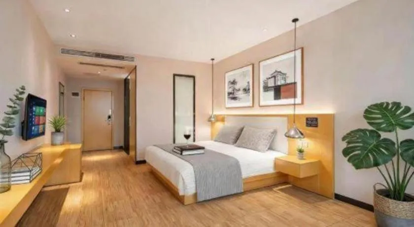 Bed in Borrman Hotel Dongguan Zhongtang