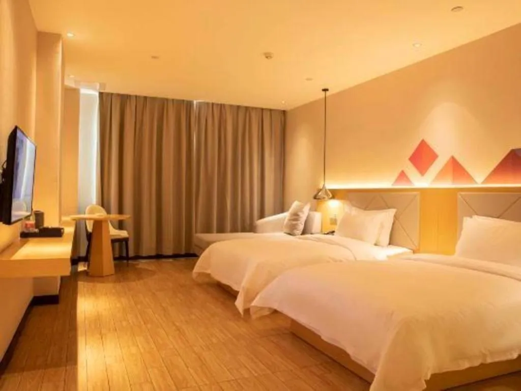 Bed in Borrman Hotel Dongguan Zhongtang