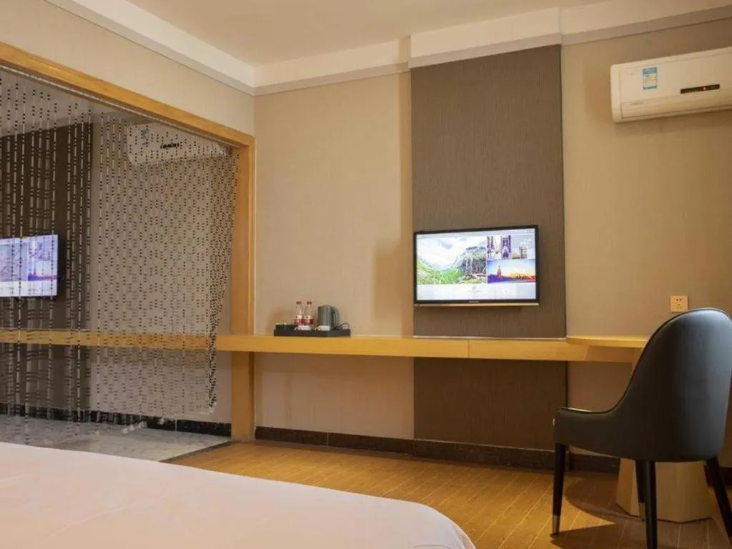 Bed in Borrman Hotel Dongguan Zhongtang