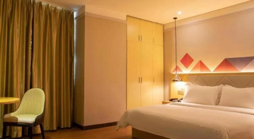 Bed in Borrman Hotel Dongguan Zhongtang