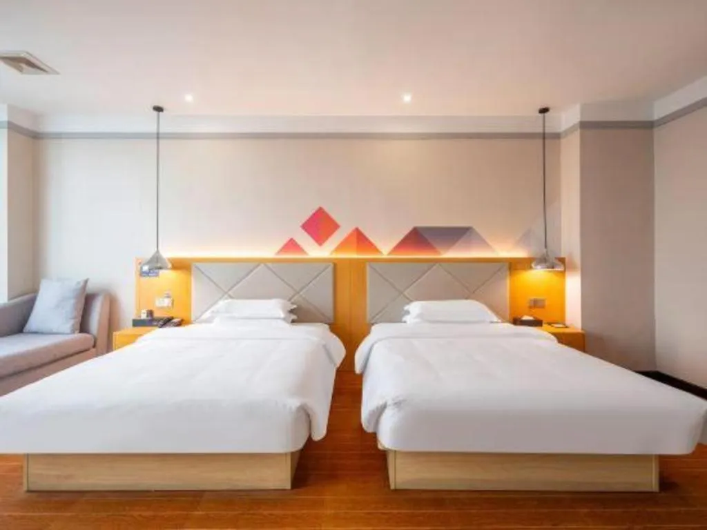 Bed in Borrman Hotel Dongguan Zhongtang