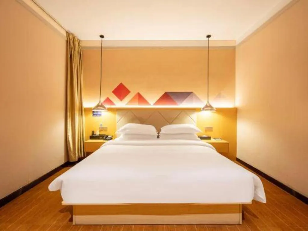 Bed in Borrman Hotel Dongguan Zhongtang