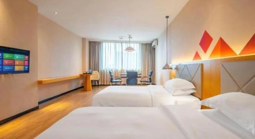 Bed in Borrman Hotel Dongguan Zhongtang