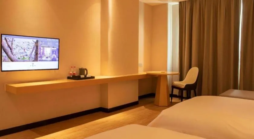 Bed in Borrman Hotel Dongguan Zhongtang