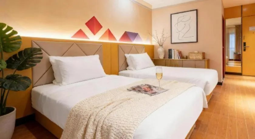 Bed in Borrman Hotel Dongguan Zhongtang