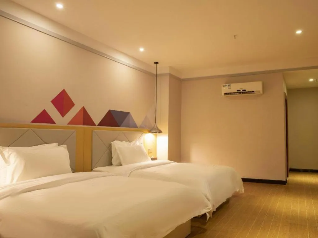 Bed in Borrman Hotel Dongguan Zhongtang