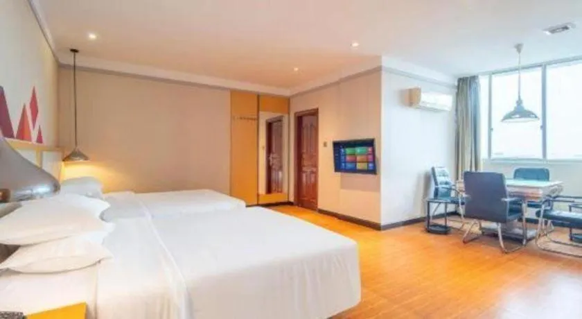 Bed in Borrman Hotel Dongguan Zhongtang