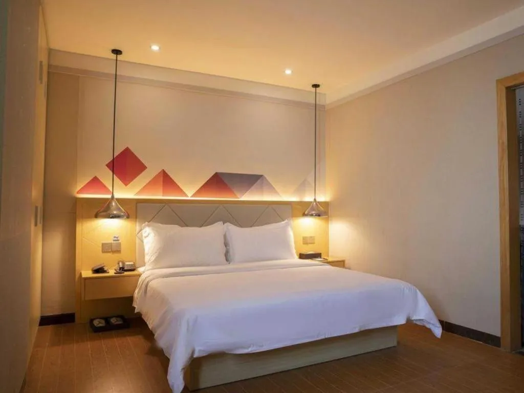 Bed in Borrman Hotel Dongguan Zhongtang