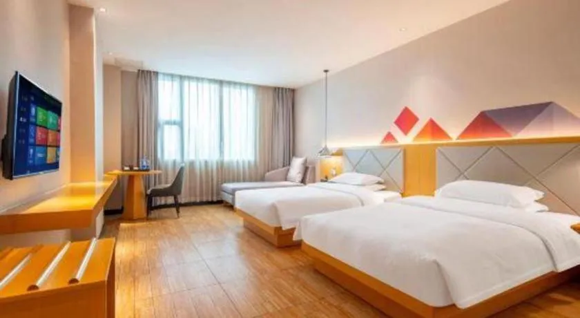 Bed in Borrman Hotel Dongguan Zhongtang