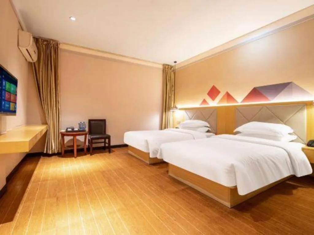 Bed in Borrman Hotel Dongguan Zhongtang
