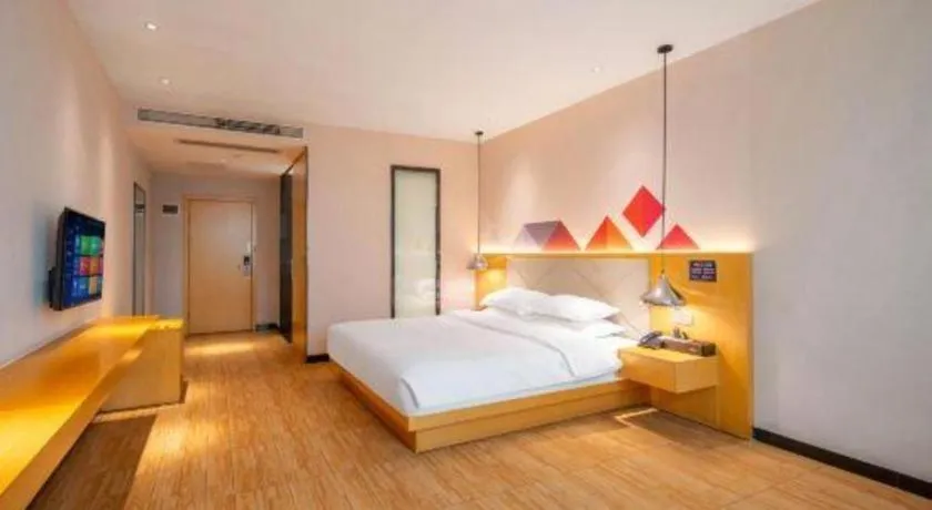 Bed in Borrman Hotel Dongguan Zhongtang