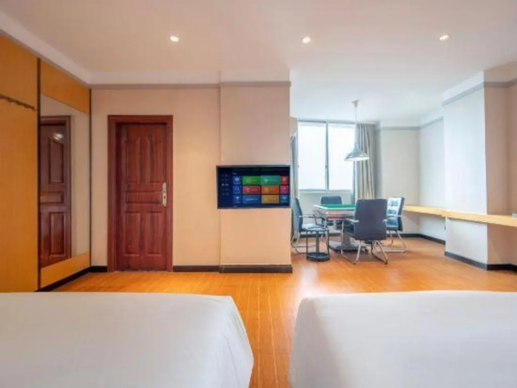 Bed in Borrman Hotel Dongguan Zhongtang