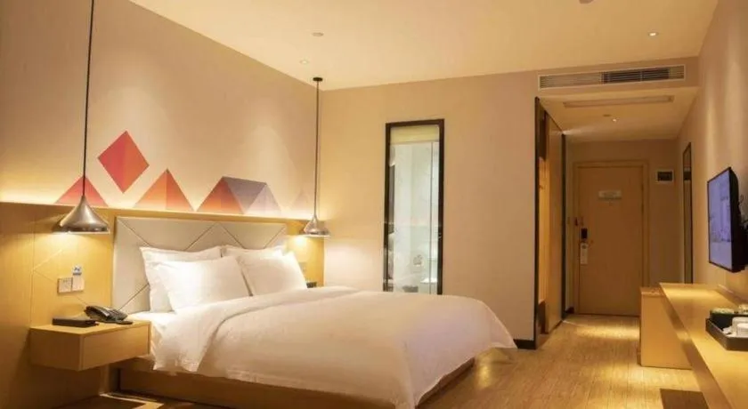 Bed in Borrman Hotel Dongguan Zhongtang