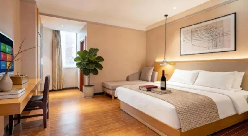 Bed in Borrman Hotel Dongguan Zhongtang