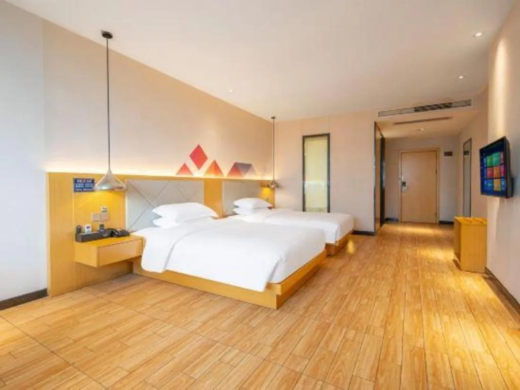 Bed in Borrman Hotel Dongguan Zhongtang