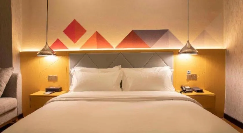 Bed in Borrman Hotel Dongguan Zhongtang