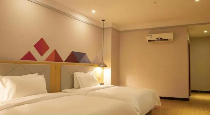 Bed in Borrman Hotel Dongguan Zhongtang