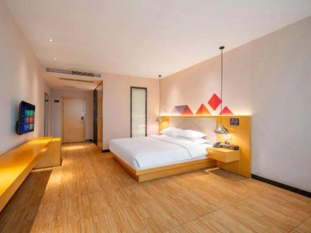 Bed in Borrman Hotel Dongguan Zhongtang