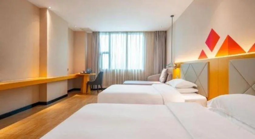 Bed in Borrman Hotel Dongguan Zhongtang