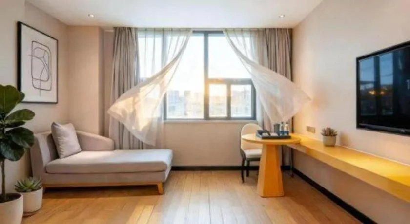 Bed in Borrman Hotel Dongguan Zhongtang