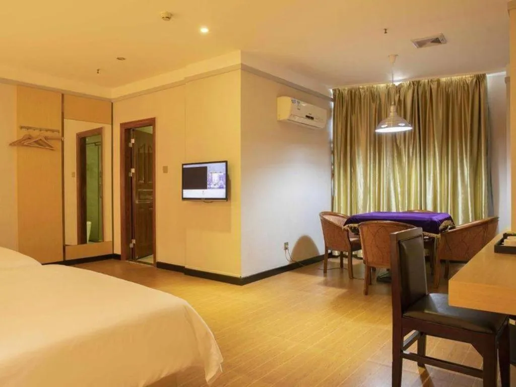 Bed in Borrman Hotel Dongguan Zhongtang