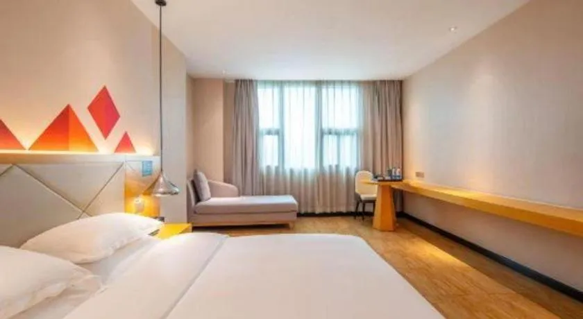 Bed in Borrman Hotel Dongguan Zhongtang