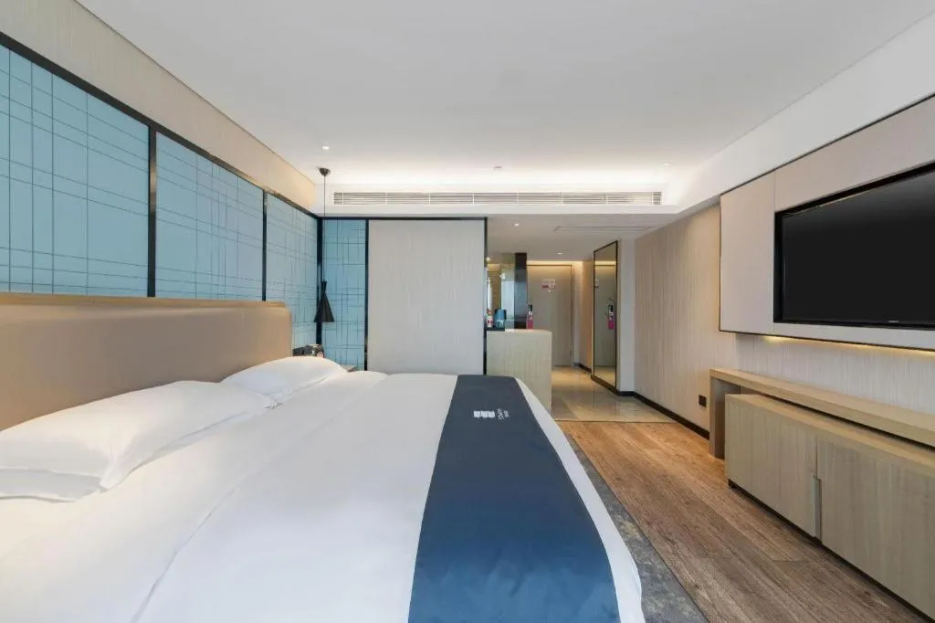 Bed in Echarm Hotel Wuhan Huangpi Xiangyang Avenue