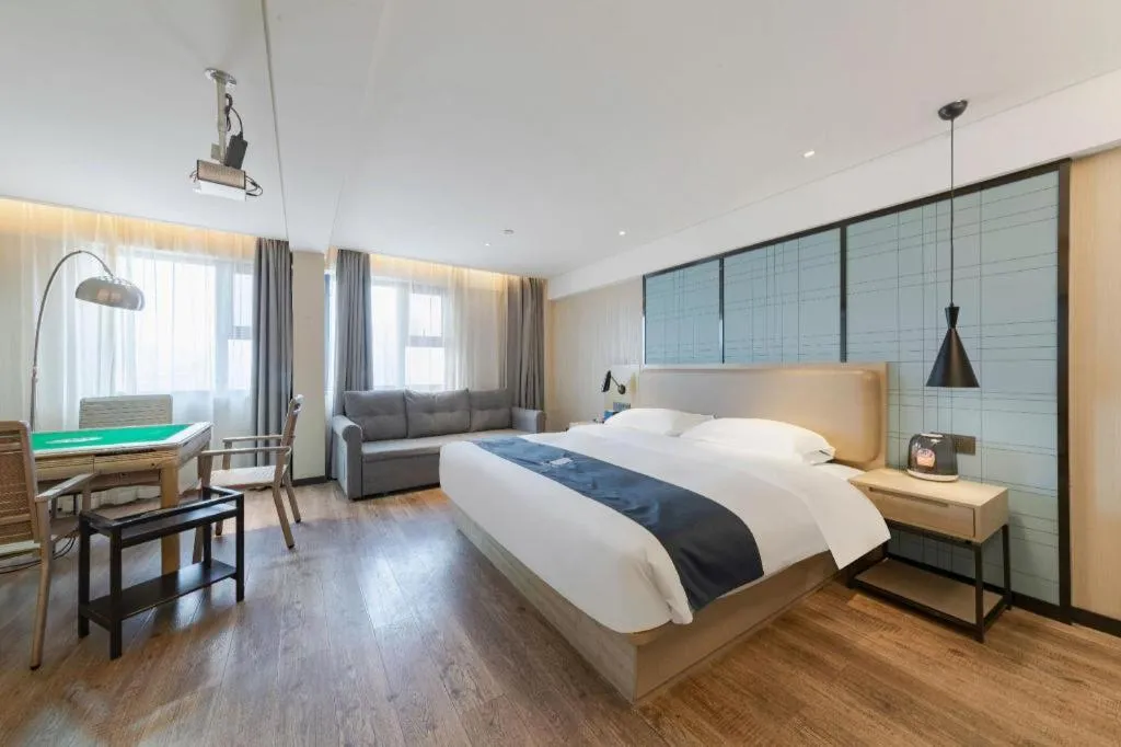 Bed in Echarm Hotel Wuhan Huangpi Xiangyang Avenue